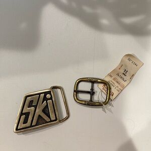 2 belt buckles Ski one is rare so cool! 😎 Levi’s one is small